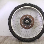 1984 Kawasaki KX250 Front Wheel Hub Rim Assembly W/ Disc. Fixed Price $159.00.