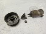 Flywheel And Starter Clutch 1986 Suzuki LT-230 Quadrunner 32102-18A00. Fixed Price $55.00.