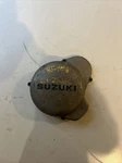 Used Suzuki Magneto Cover 85-86 LT250 11351-19A00 U16. Fixed Price $15.00.
